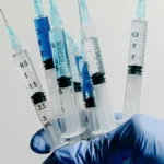Auto‑disable syringe safe injection preventing HIV/hepatitis.