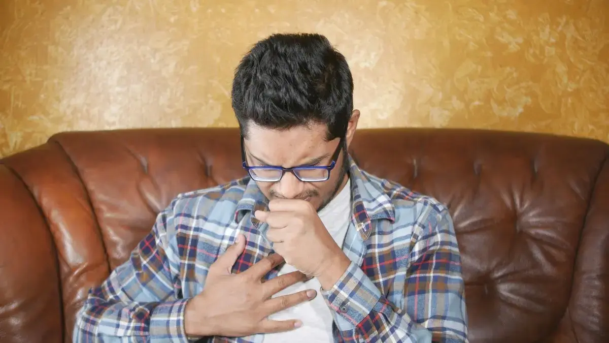 Cough syrup bottles containing DXM warning about abuse risk.