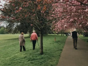 Person walking outdoors exercise guidance for diabetic patients.