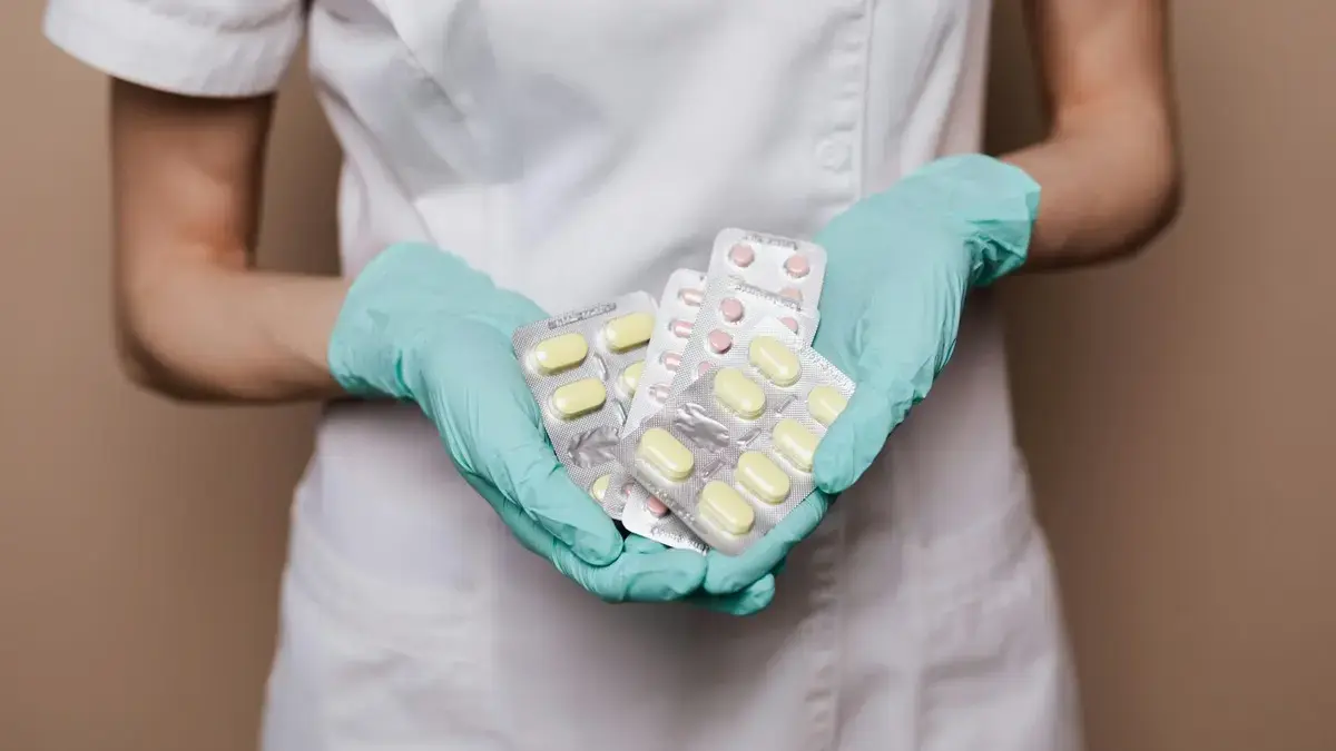 Doctor and patient in private clinic antibiotic resistance concern.