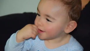 Bottle of Coferb Ivy‑Leaf Extract Cough Syrup and text describing benefits and usage