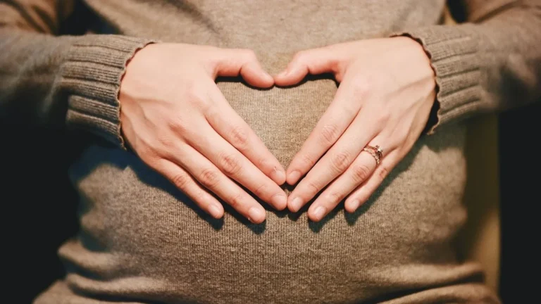 Various potassium‑rich fruits (banana, avocado, orange, kiwi, pomegranate) ideal for pregnancy nutrition.