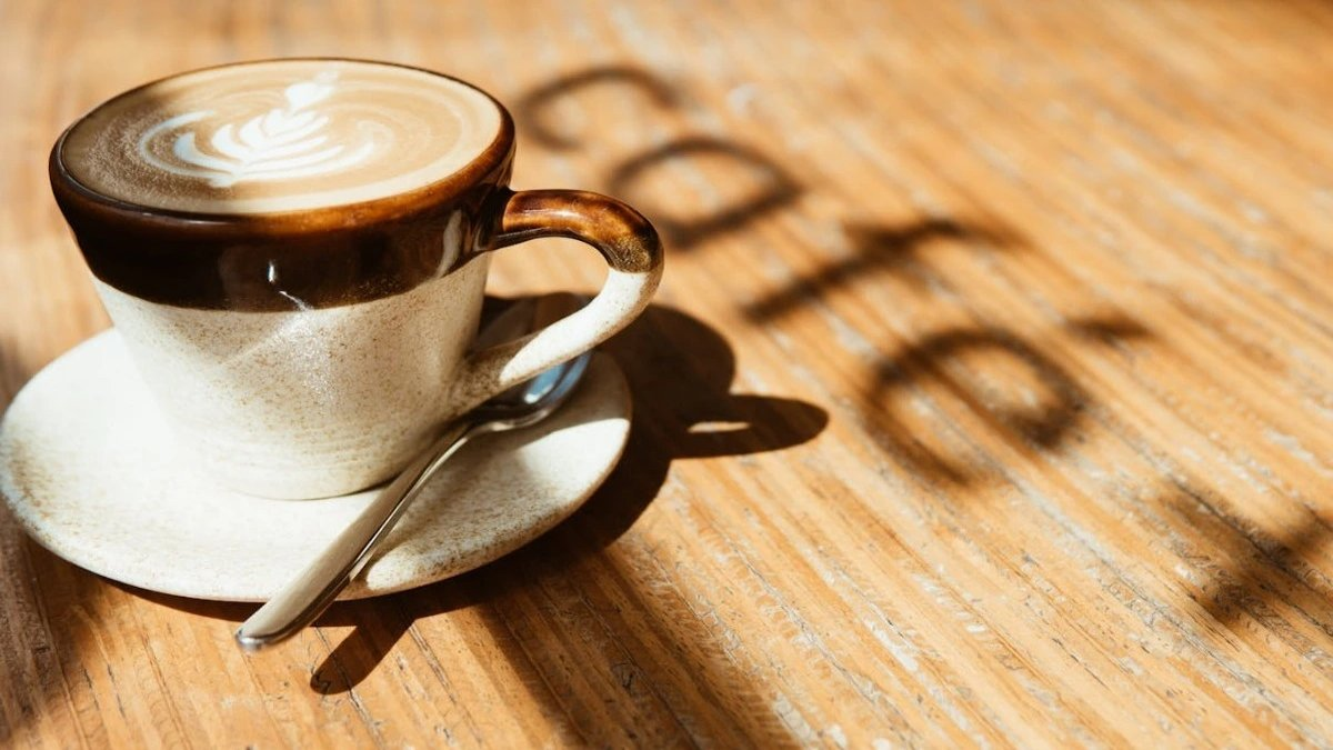 Coffee cup and bone health illustration for winter bone loss article