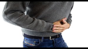 Illustration of home remedies for mild diarrhea: glass of water, simple food, and digestive care.