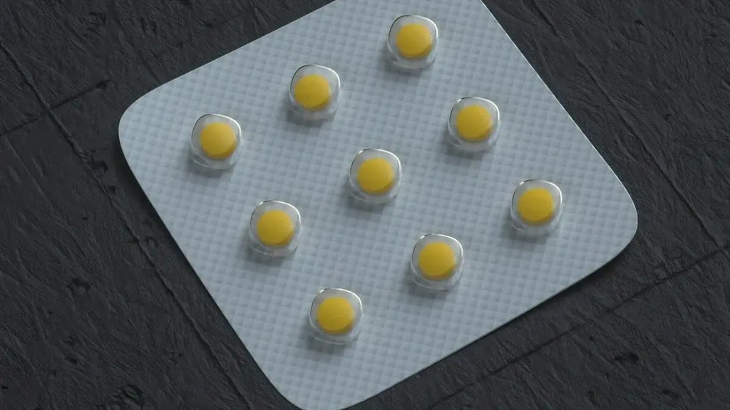 Close‑up image of a folic acid supplement bottle and capsules representing unmetabolized folic acid in the bloodstream.