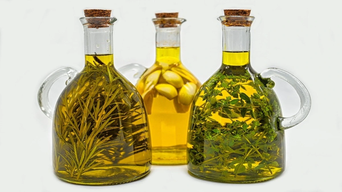 Assorted cooking oils including canola, mustard, sunflower, olive, and coconut oil for heart‑healthy cooking