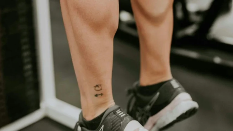 Seated person performing heel raises to activate the soleus muscle for blood sugar control