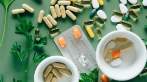 Illustration showing acid reducing medicines like omeprazole affecting stomach acid and vitamin B12 absorption.