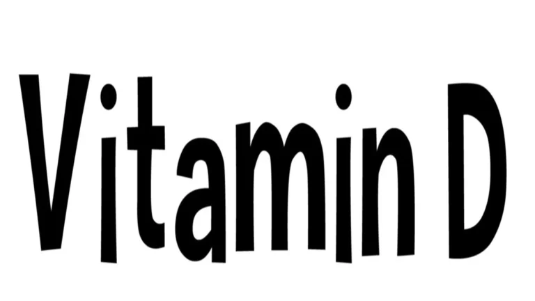 Vitamin D supplements beside a blood sugar monitor representing diabetes risk reduction research