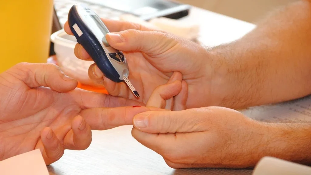 Diabetes treatment concept with insulin pen and blood glucose monitor in 2026