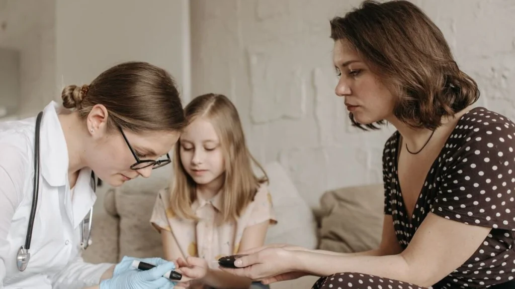 Child with type 2 diabetes checking blood sugar levels as Farxiga and Jardiance become new treatment options for children aged 10 and older.