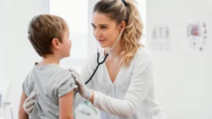 Mother giving antihistamine medicine to a child for allergy treatment while supporting long-term health.