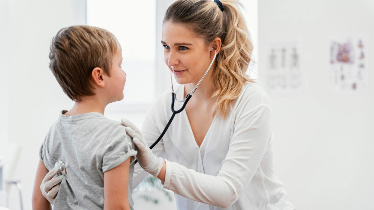 Mother giving antihistamine medicine to a child for allergy treatment while supporting long-term health.