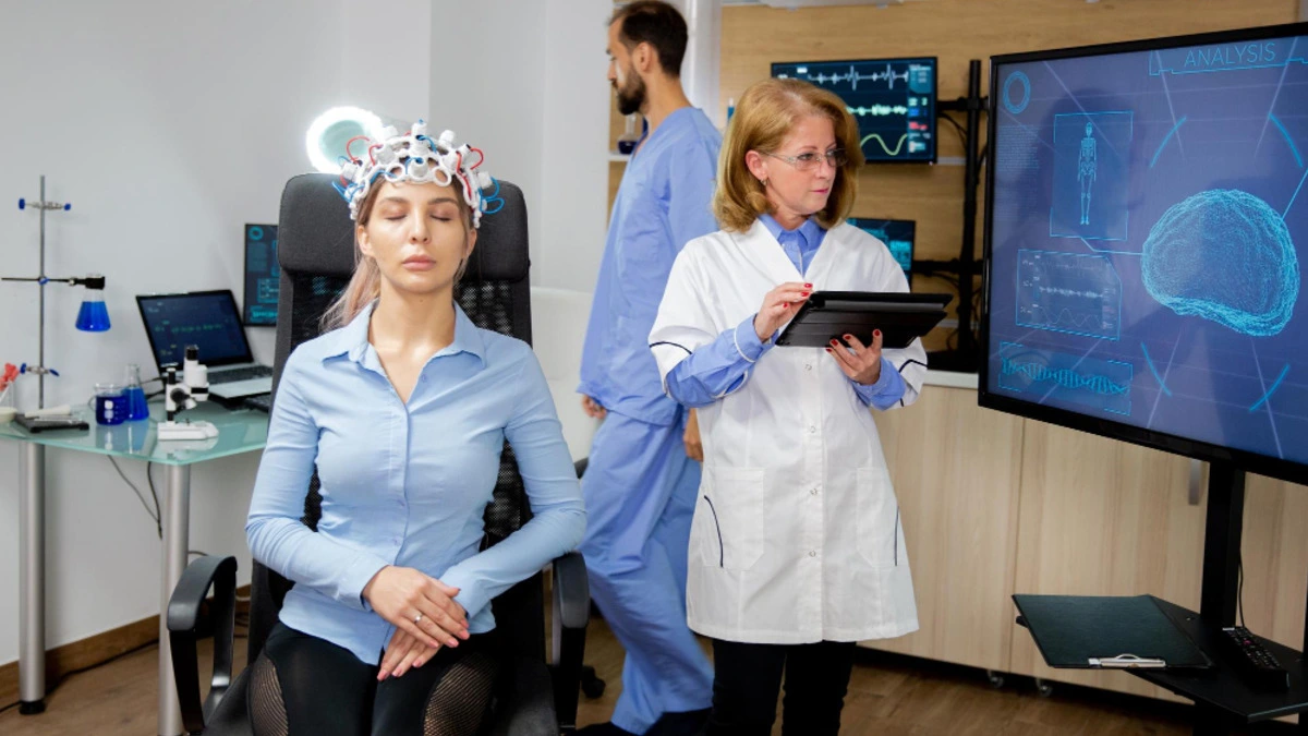 Transcranial Magnetic Stimulation (TMS) therapy being performed on a patient for treatment-resistant depression.
