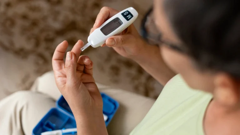 Person holding diabetes injection pen representing Ozempic vs Mounjaro (semaglutide vs tirzepatide) comparison for weight loss and blood sugar control.