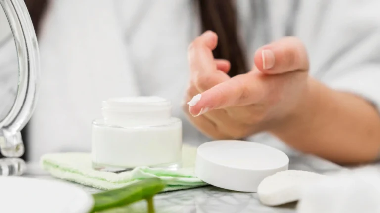 Pharmacist applying fragrance-free ceramide moisturizer to eczema-affected skin