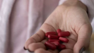 Iron supplement side effects including constipation, nausea, and dark stool