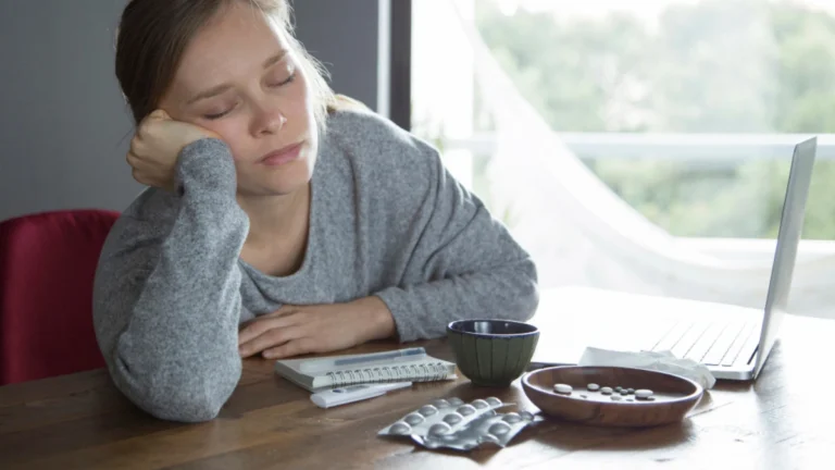 Woman feeling exhausted due to low ferritin levels without anemia